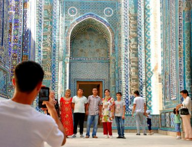 group of people in front of a cathedral